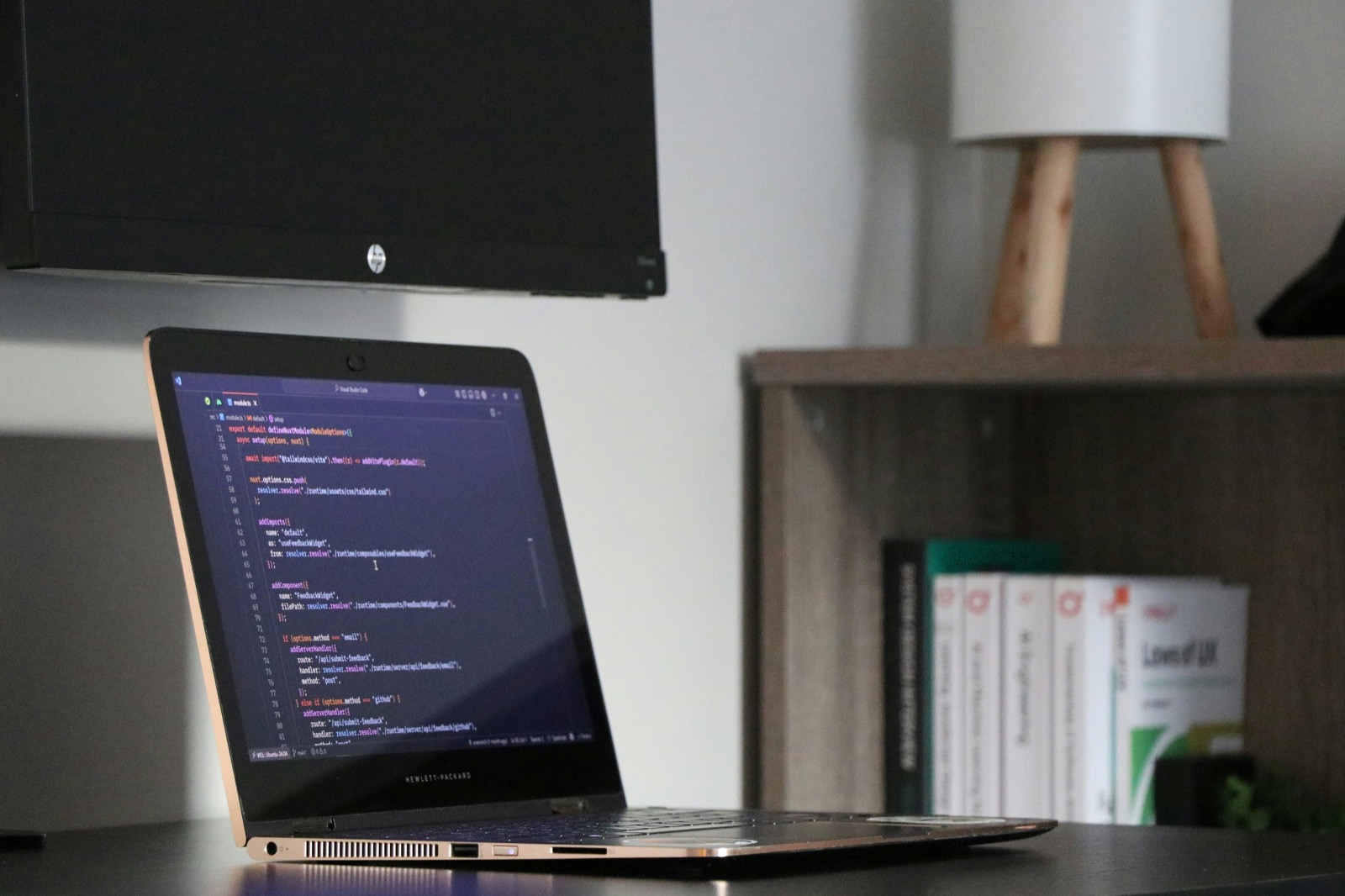 Code displayed on a laptop screen in a quiet workspace